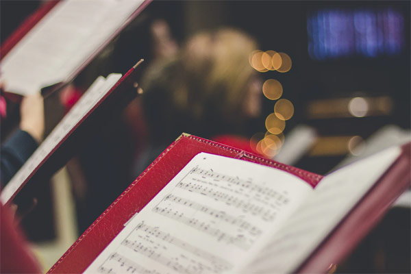 Closeup photo of a choir booklet with sheet music